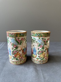 A pair of Chinese reticulated Canton famille rose brush pots, 19th C.