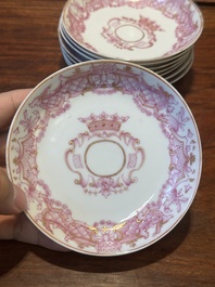 A 28-piece Chinese puce-enamelled and gilt armorial tea service with crowned monograms, Qianlong