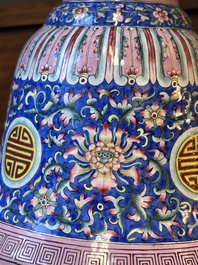 A large Chinese Canton enamel blue-ground 'shou' candlestick, Qianlong/Jiaqing