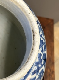 A Chinese blue and white 'lotus scroll' vase and cover, Kangxi