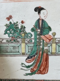 A rectangular Chinese famille verte plaque in a wooden faux bamboo frame, Kangxi