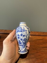 Een paar Chinese blauw-witte vazen en vier zoutvaten in blauw-wit, famille rose en Imari-stijl, Kangxi/Qianlong