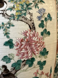 A Chinese famille rose garden seat with birds among blossoming branches, 19th C.