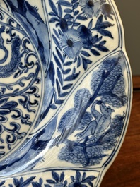 Four Chinese blue and white lobed 'phoenix and monkey' plates, flower mark, Kangxi