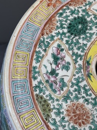 A Chinese famille rose garden seat with birds among blossoming branches, 19th C.