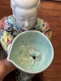 A Chinese famille rose figure of a lady with a bowl, Yongzheng