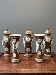 A Chinese capucin-brown-ground famille rose garniture of five vases with floral design, Qianlong