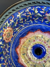 A large Chinese Canton enamel blue-ground 'shou' candlestick, Qianlong/Jiaqing