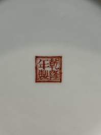 A Chinese famille rose dish with figural design and a 'rice production' vase, Qianlong mark, 20th C.