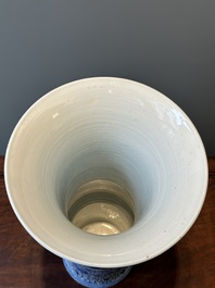 A Chinese blue and white 'chrysanthemum scroll' 'gu' vase, Kangxi