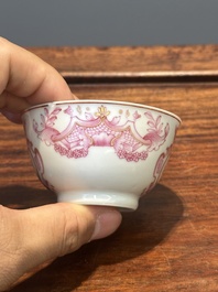 A 28-piece Chinese puce-enamelled and gilt armorial tea service with crowned monograms, Qianlong