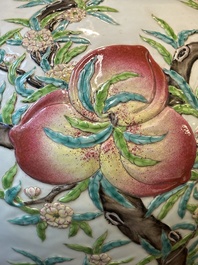 A Chinese famille rose relief-molded 'tianqiuping' vase with nine peaches, Qianlong mark, 19/20th C.