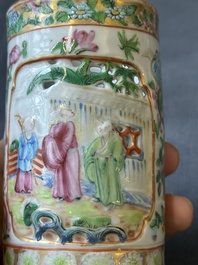 A pair of Chinese reticulated Canton famille rose brush pots, 19th C.