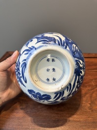 A Chinese blue and white 'birds among flowering branches' bowl, Shen De Tang Bo Gu Zhi 慎德堂博古製 mark, Kangxi