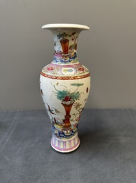 A small Chinese famille rose 'nine peaches' vase and an 'antiquities' vase, 19th C.