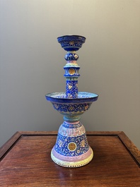 A large Chinese Canton enamel blue-ground 'shou' candlestick, Qianlong/Jiaqing