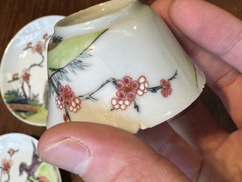 A pair of Chinese famille rose cups and saucers with horses, Yongzheng