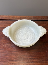An important Chinese chrysanthemum-shaped very pale celadon jade marriage bowl, 18th C.