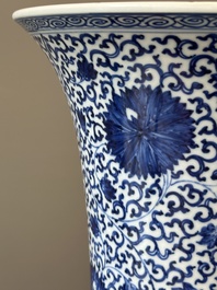 A Chinese blue and white 'chrysanthemum scroll' 'gu' vase, Kangxi
