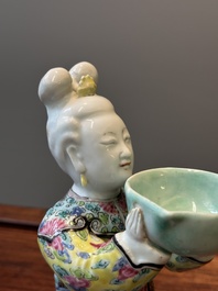 A Chinese famille rose figure of a lady with a bowl, Yongzheng
