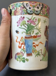 A pair of Chinese reticulated Canton famille rose brush pots, 19th C.
