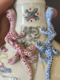 A Chinese famille rose '18 Luohan' bottle vase, 19th C.