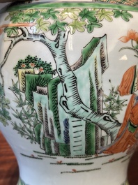 A Chinese famille verte covered vase and a bottle vase, 19th C.
