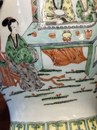 A Chinese famille verte covered vase and a bottle vase, 19th C.