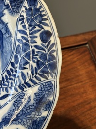 Four Chinese blue and white lobed 'phoenix and monkey' plates, flower mark, Kangxi