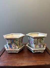 A pair of hexagonal Chinese Canton famille rose jardinieres on stands, 19th C.