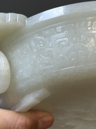 An important Chinese chrysanthemum-shaped very pale celadon jade marriage bowl, 18th C.