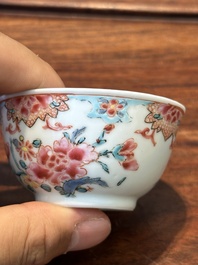 Nine Chinese famille rose cups and eight saucers, Yongzheng/Qianlong