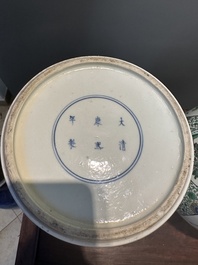 A pair of Chinese famille verte 'bird and flower' vases and covers, Kangxi mark, 19th C.