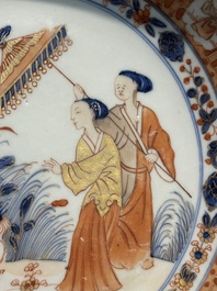 Assiette en porcelaine de Chine de style Imari &agrave; d&eacute;cor des 'Dames au parasol', Qianlong