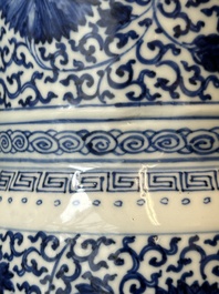 A Chinese blue and white 'chrysanthemum scroll' 'gu' vase, Kangxi