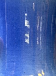 A pair of Chinese monochrome blue-glazed wall pocket vases, 19/20th C.