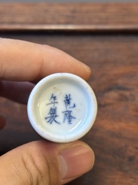 Two Chinese blue, white and copper-red snuff bottles, Qianlong mark, 19th C.
