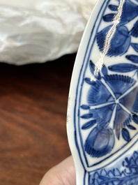Four Chinese blue and white lobed 'phoenix and monkey' plates, flower mark, Kangxi