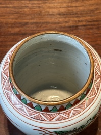 A small Chinese wucai jar with figures in a landscape, Transitional period