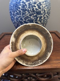 A Chinese blue and white 'lotus scroll' vase and cover, Kangxi