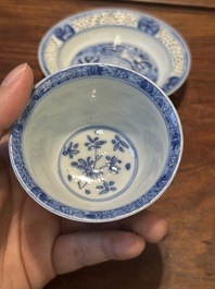 A Chinese blue and white reticulated double-walled cup and saucer, Kangxi