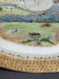 An oval Chinese monogrammed Canton famille rose dish with landscape design, 19th C.
