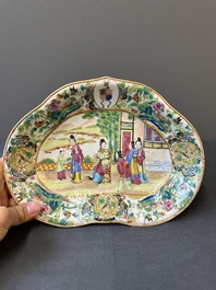 A Chinese Canton famille rose lobed armorial dish and a plate, 19th C.