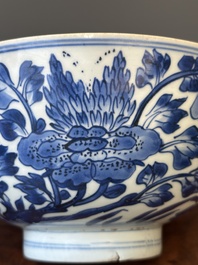 A Chinese blue and white 'birds among flowering branches' bowl, Shen De Tang Bo Gu Zhi 慎德堂博古製 mark, Kangxi