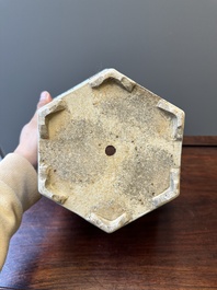 A pair of hexagonal Chinese Canton famille rose jardinieres on stands, 19th C.