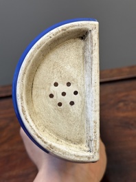 A pair of Chinese monochrome blue-glazed wall pocket vases, 19/20th C.