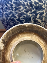 A Chinese blue and white 'lotus scroll' vase and cover, Kangxi