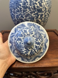 A Chinese blue and white 'lotus scroll' vase and cover, Kangxi