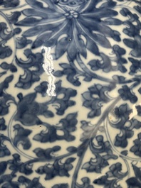A Chinese blue and white 'lotus scroll' vase and cover, Kangxi