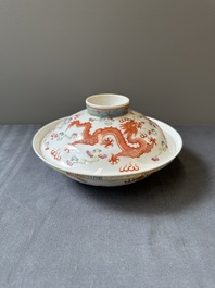 A Chinese famille rose bowl and cover with dragons chasing pearls, Guangxu mark, 19th C.